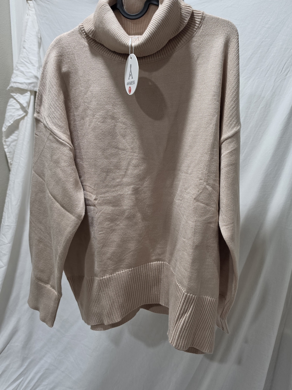 A New Day Cream Blush Turtleneck Sweater